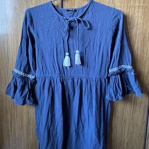 blue frock with tassels